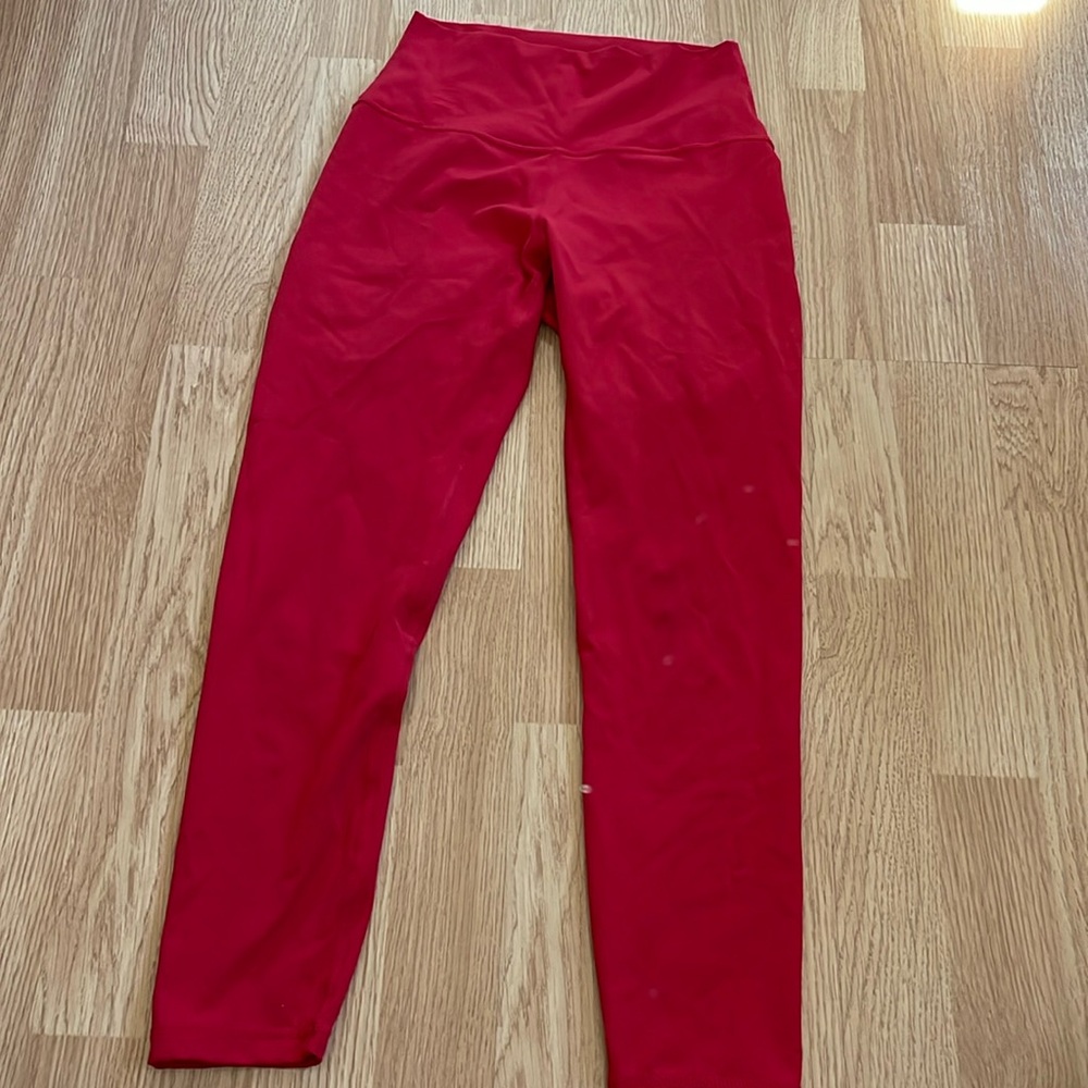 Born primitive your go to leggings red size medium EUC